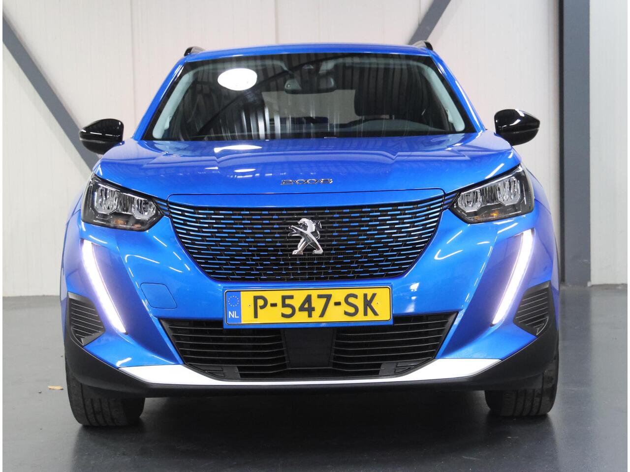 Peugeot e-2008 EV Allure Pack 50 kWh 136PK | 1ste eigenaar | AppleCarplay/Android Auto | 17"LMV | Camera | AUTOMAAT | Keyless | Adaptive Cruise Control | Climate Control | FULL LED | Isofix | Privacy Glass |
