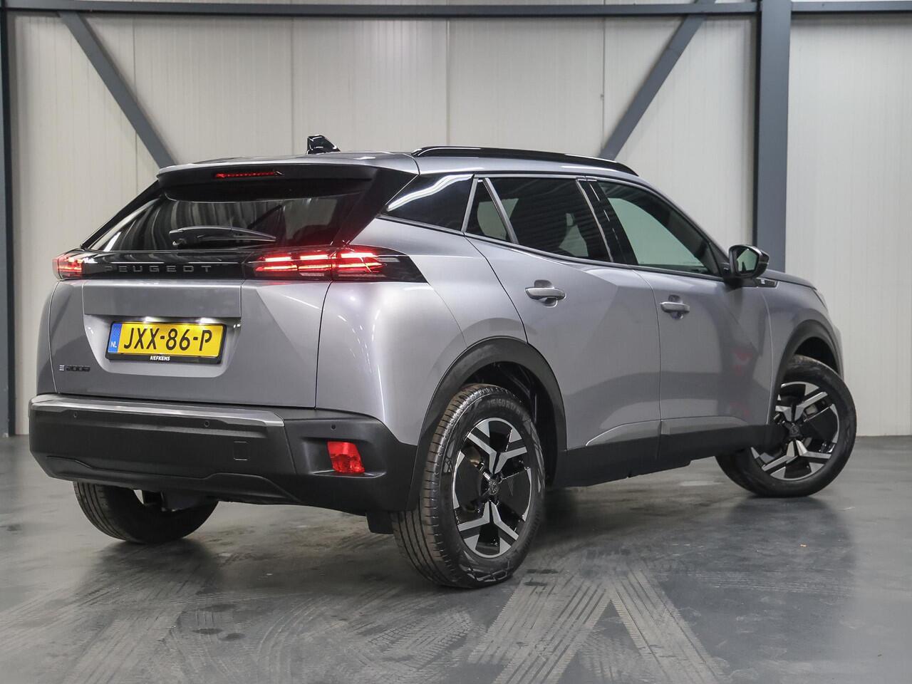 Peugeot e-2008 EV Allure 50 kWh 136PK | Accurapport 100%| 1ste eigenaar | AppleCarplay/Android Auto | Armsteun | 17"LMV | AUTOMAAT | Keyless | Cruise Control | Climate Control | FULL LED | Isofix | Parkeersensoren | Privacy Glass |