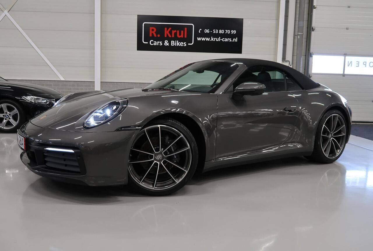 Porsche 911 Cabrio 3.0 Carrera 992 Bose 360 Camera Sportuitlaat PASM Sport-Chrono 21 inch Approved garantie 10/2026 Cabriolet 4 Nieuwe banden Groot onderhoud gehad PPF folie NIEUWSTAAT Flippers Stoelverkoeling LED PDLS