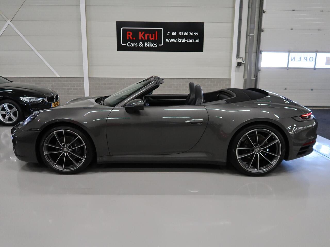 Porsche 911 Cabrio 3.0 Carrera 992 Bose 360 Camera Sportuitlaat PASM Sport-Chrono 21 inch Approved garantie 10/2026 Cabriolet 4 Nieuwe banden Groot onderhoud gehad PPF folie NIEUWSTAAT Flippers Stoelverkoeling LED PDLS