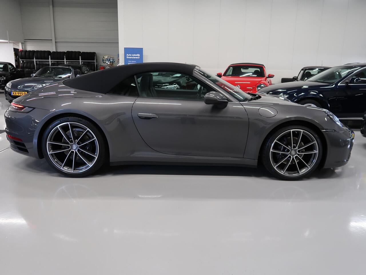 Porsche 911 Cabrio 3.0 Carrera 992 Bose 360 Camera Sportuitlaat PASM Sport-Chrono 21 inch Approved garantie 10/2026 Cabriolet 4 Nieuwe banden Groot onderhoud gehad PPF folie NIEUWSTAAT Flippers Stoelverkoeling LED PDLS