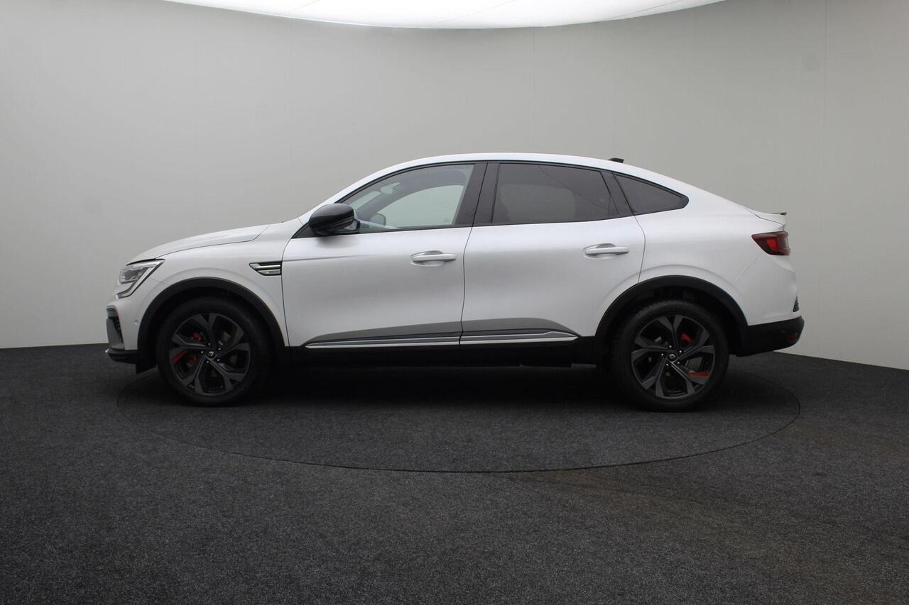 Renault Arkana 1.6 E-Tech Hybrid 145 R.S. Line 2021 | Navigatie | Cruise Control Adaptief | Verwarmde Voorstoelen | Bose Audio | Draadloze Telefoon Lader | Achteruitrij Camera | 2 Sleutels | NAP