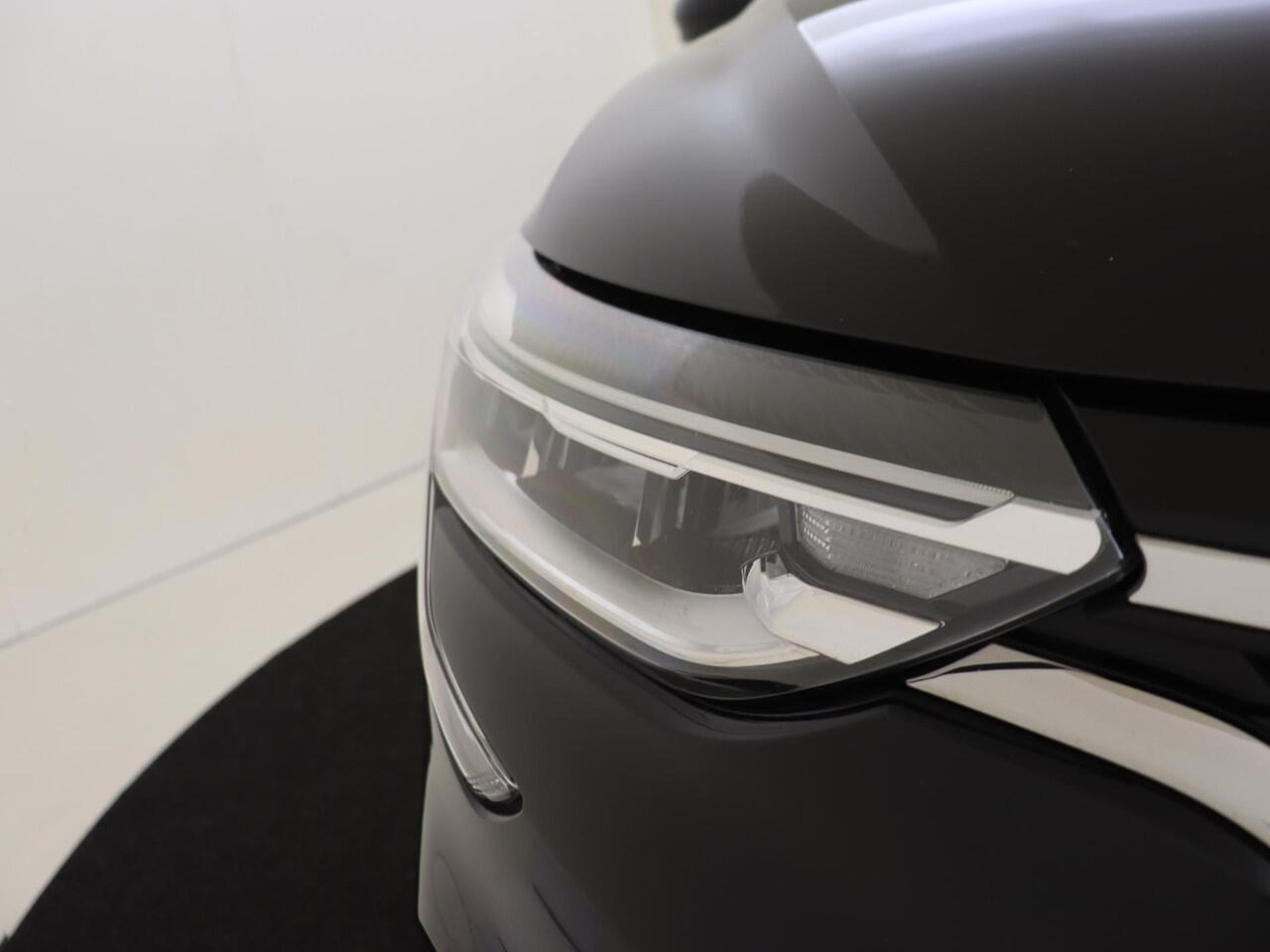 Renault Arkana 1.6 145Pk E-Tech Intens | Navigatie | Apple & Android Carplay | Climate Control | Adaptieve Cruise Control | Parkeersensoren Voor en Achter | Privacy Glass | Keyless Entry | Licht & Regensensor |