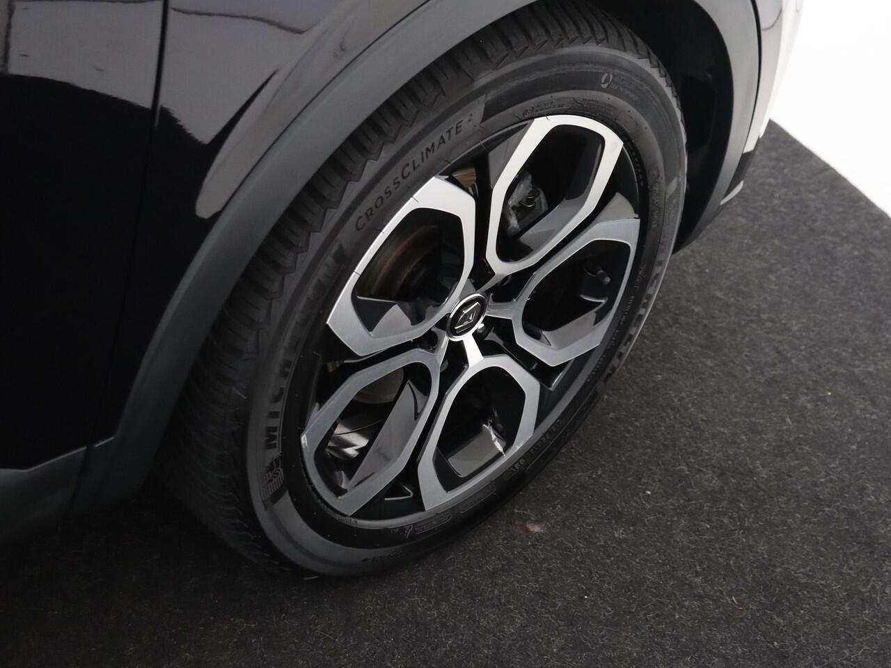 Renault Arkana 1.6 145Pk E-Tech Intens | Navigatie | Apple & Android Carplay | Climate Control | Adaptieve Cruise Control | Parkeersensoren Voor en Achter | Privacy Glass | Keyless Entry | Licht & Regensensor |