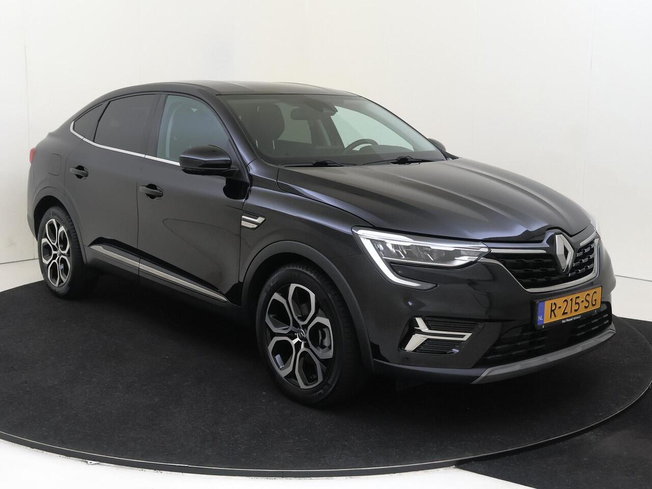 Renault Arkana 1.6 145Pk E-Tech Intens | Navigatie | Apple & Android Carplay | Climate Control | Adaptieve Cruise Control | Parkeersensoren Voor en Achter | Privacy Glass | Keyless Entry | Licht & Regensensor |