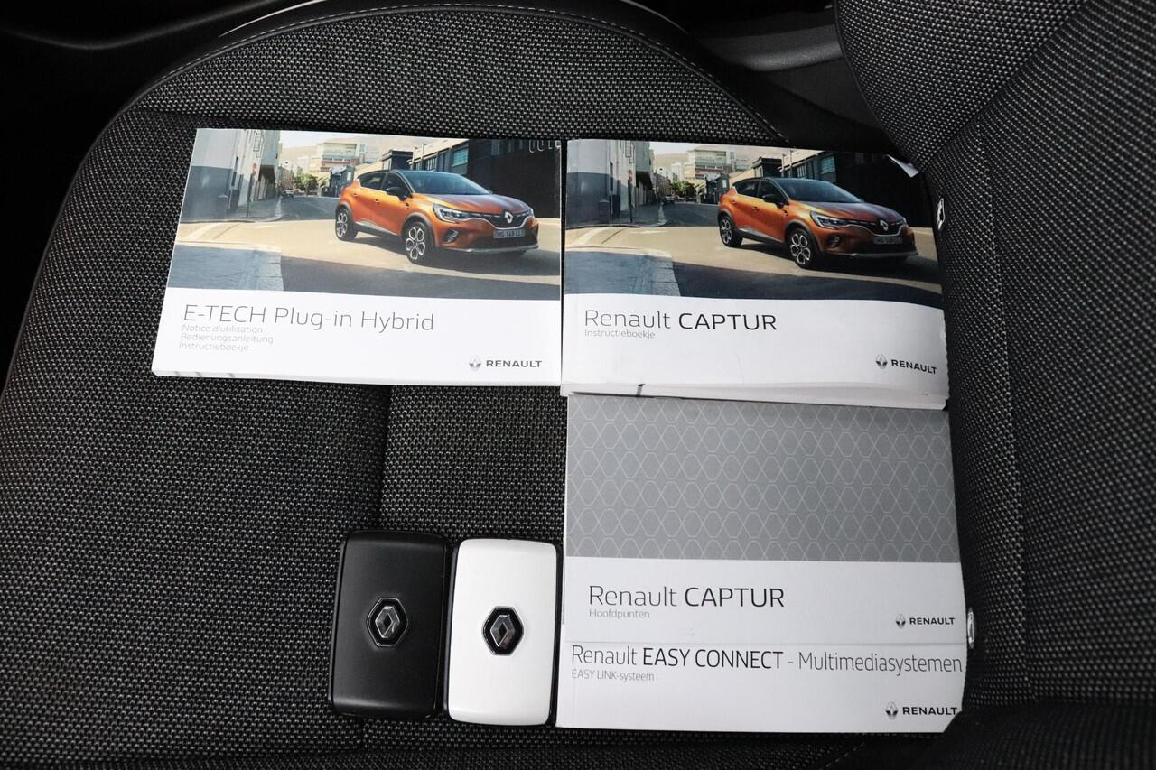 Renault CAPTUR 1.6 E-Tech Plug-in Hybrid 160 Intens | 1e Eigenaar | Dealeronderhouden | Trekhaak | Metallic Wit |
