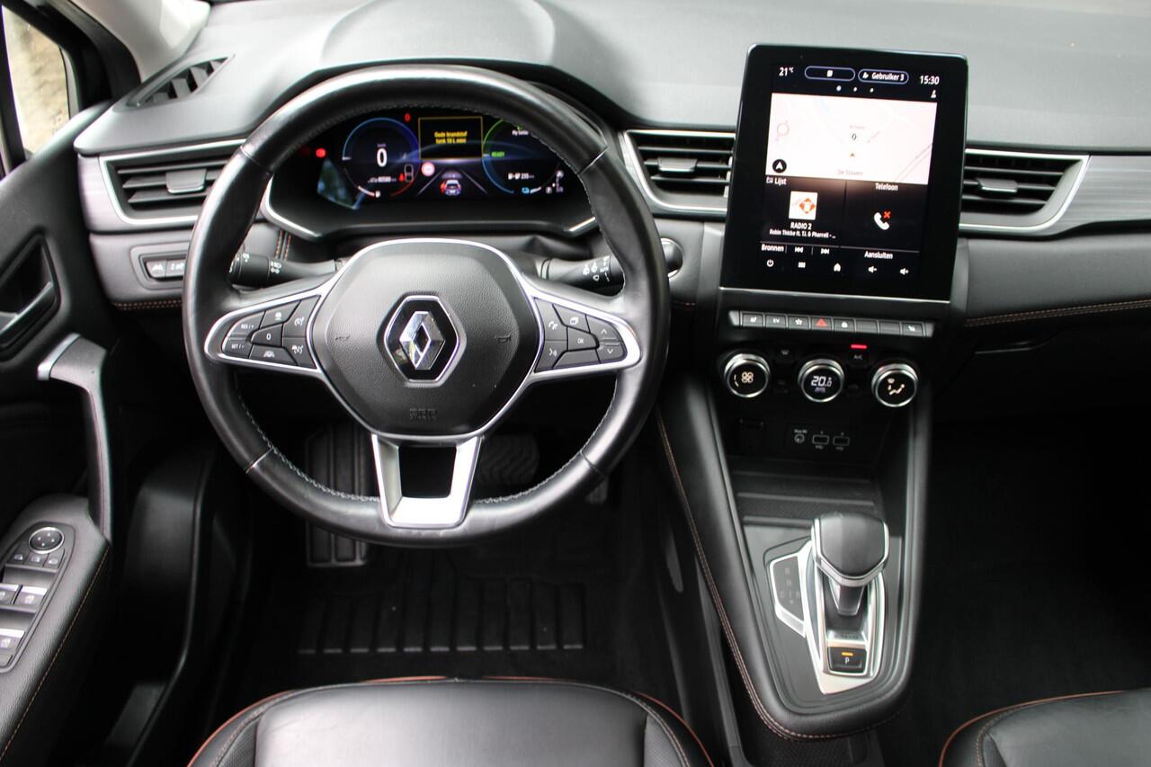 Renault CAPTUR 1.6 E-Tech plug-in hybrid 160 Initiale Paris Automaat | Stoelverwarming | Lederen bekleding | Adaptieve cruise control