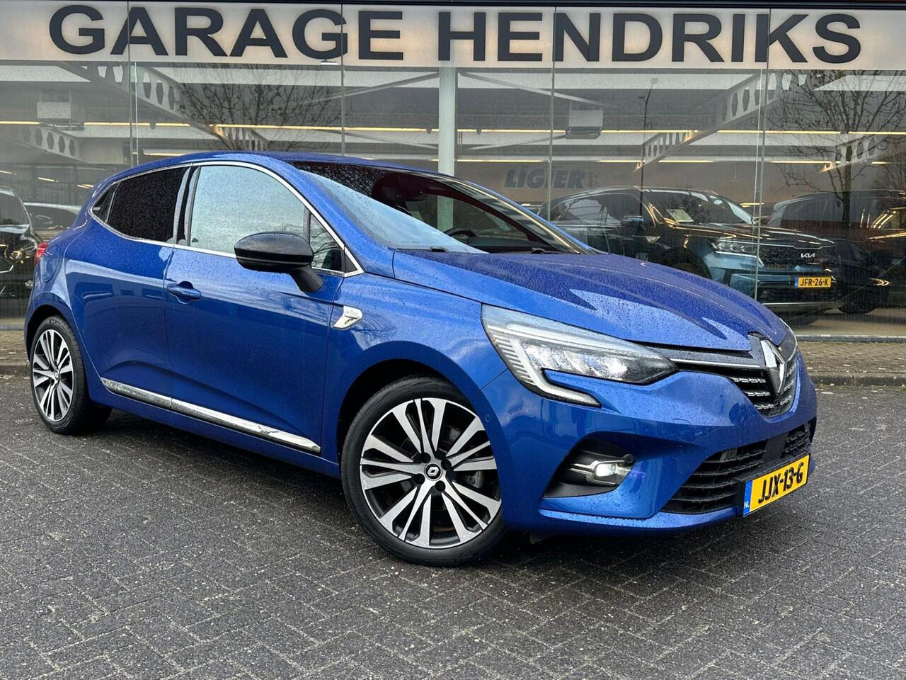 Renault CLIO 1.6 E-Tech Hybrid 140 Initiale Paris | Leder | Blindspot | 360 Cam | stuur/stoel verwarming | occasion