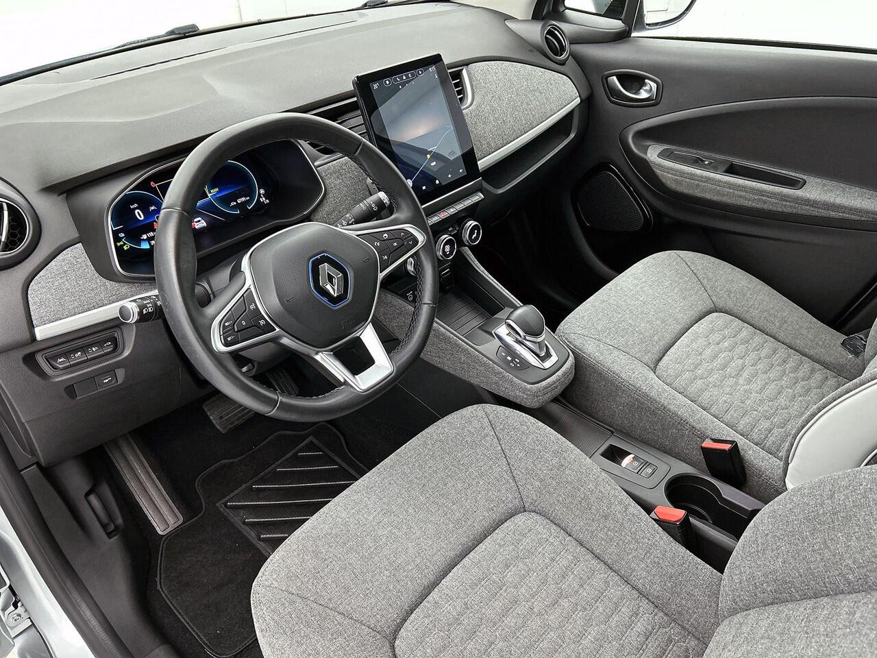 Renault ZOE R135 Intens 135Pk 52 kWh (ex Accu) Huuraccu vanaf ¤ 79,- p.m.| Navigatie | Warmtepomp | Achteruitrijcamera | Dodenhoekdetectie | Cruise & Climate Controle |