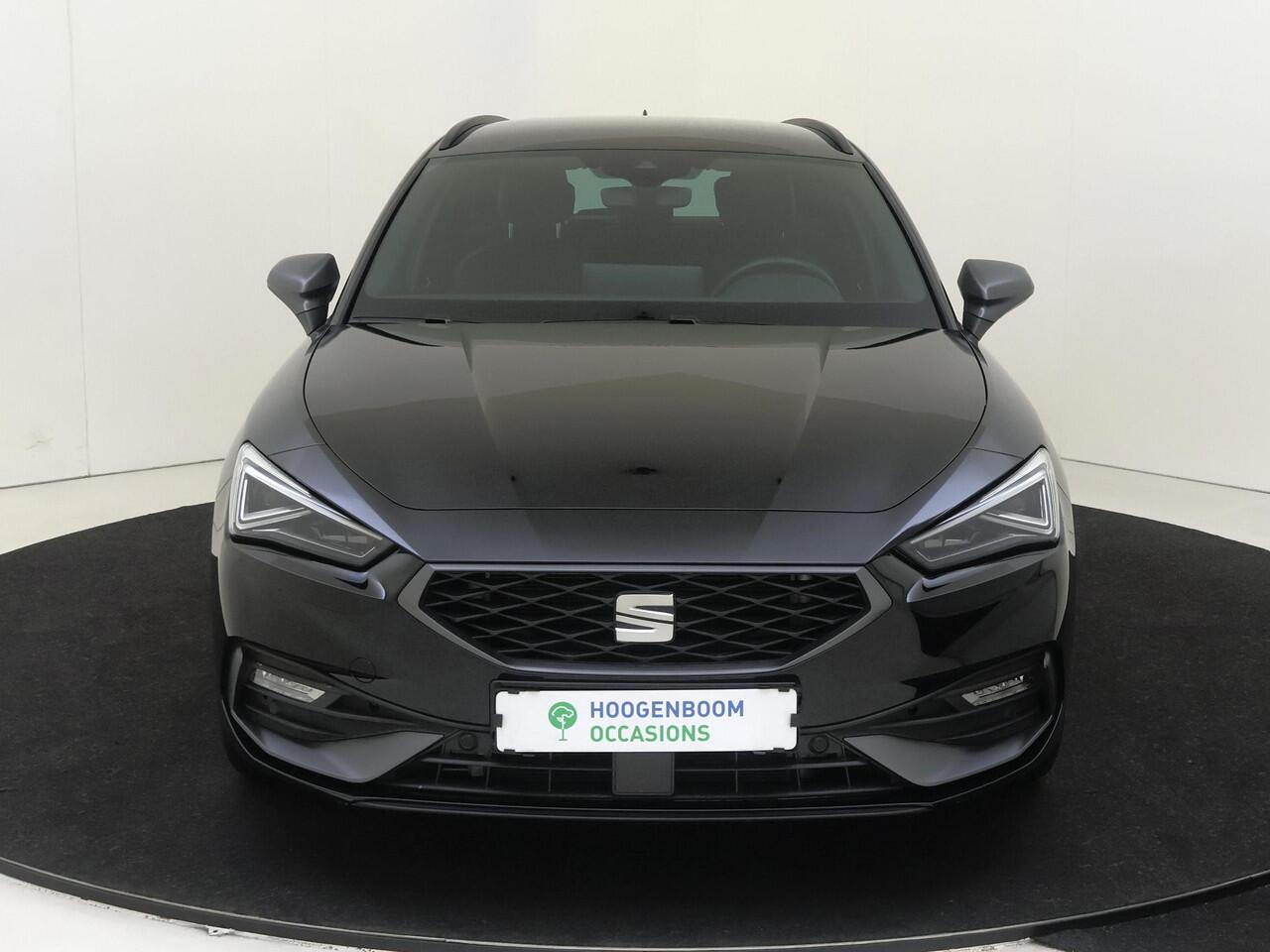 Seat LEON Sportstourer 1.5 TSI e-Hybrid FR Business | SoH 100% | Trekhaak | Parkeerassistent | Keyless | Adaptieve cruise control | Dodehoek detectie | Stoel- en stuurwielverwarming | Navigatie | Achteruitrijcamera |