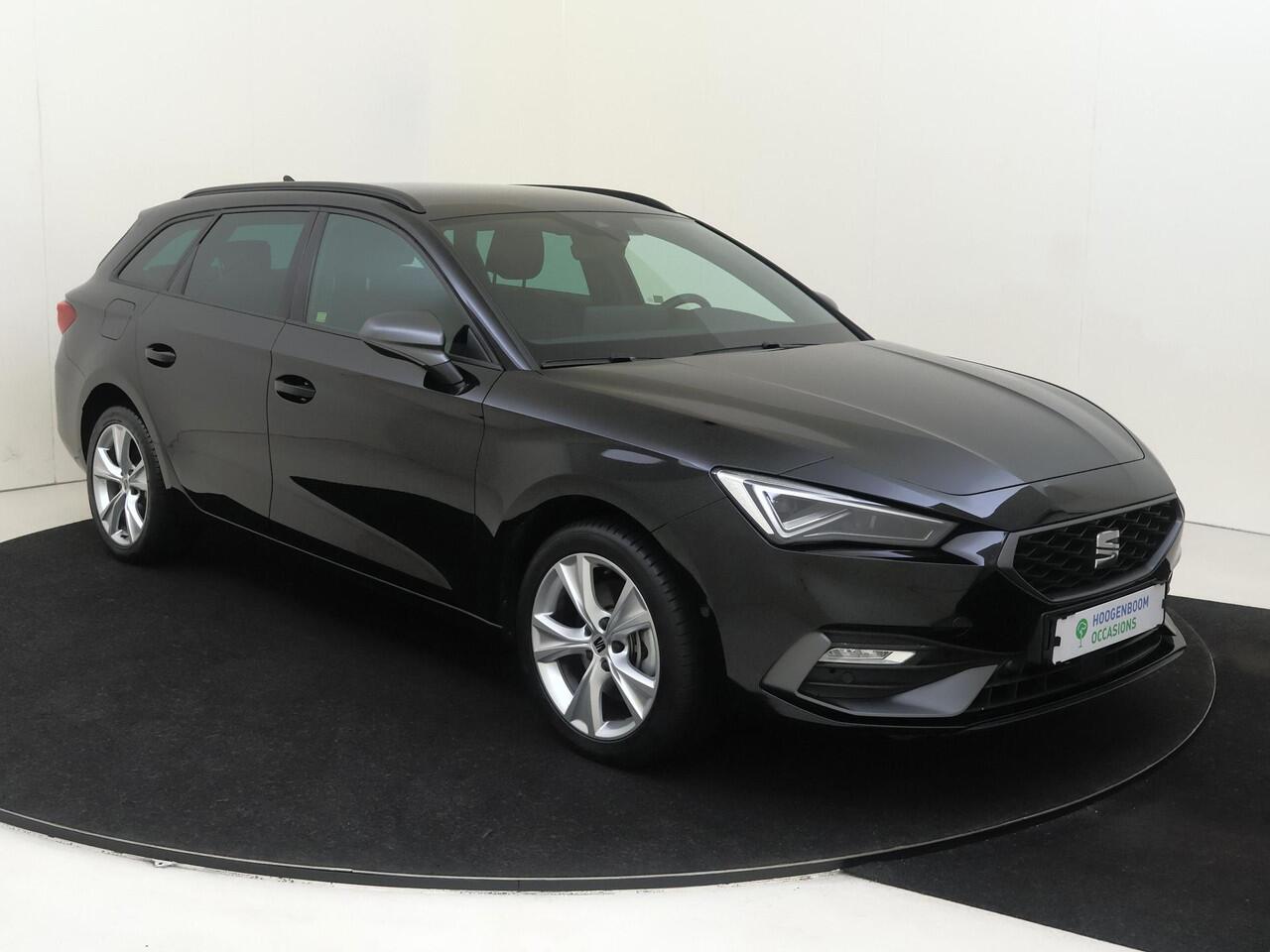 Seat LEON Sportstourer 1.5 TSI e-Hybrid FR Business | SoH 100% | Trekhaak | Parkeerassistent | Keyless | Adaptieve cruise control | Dodehoek detectie | Stoel- en stuurwielverwarming | Navigatie | Achteruitrijcamera |