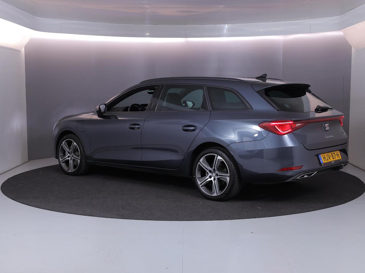 Seat LEON Sportstourer 1.5 TSI e-Hybrid FR PHEV First Edition 204 pk Automaat | Verlengde garantie | Navigatie | Parkeersensoren | Achteruitrijcamera | Adaptieve cruise control |