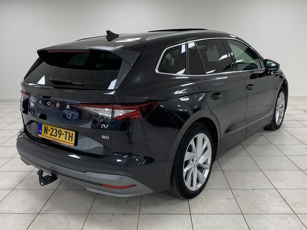 Skoda Enyaq iV 80 PANORAMADAK | UITKLAPBARE TREKHAAK | SOH 91,9 % | RONDOM ZICHT CAMERA | LEDEREN BEKLEDING