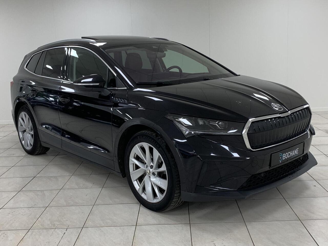 Skoda Enyaq iV 80 PANORAMADAK | UITKLAPBARE TREKHAAK | SOH 91,9 % | RONDOM ZICHT CAMERA | LEDEREN BEKLEDING