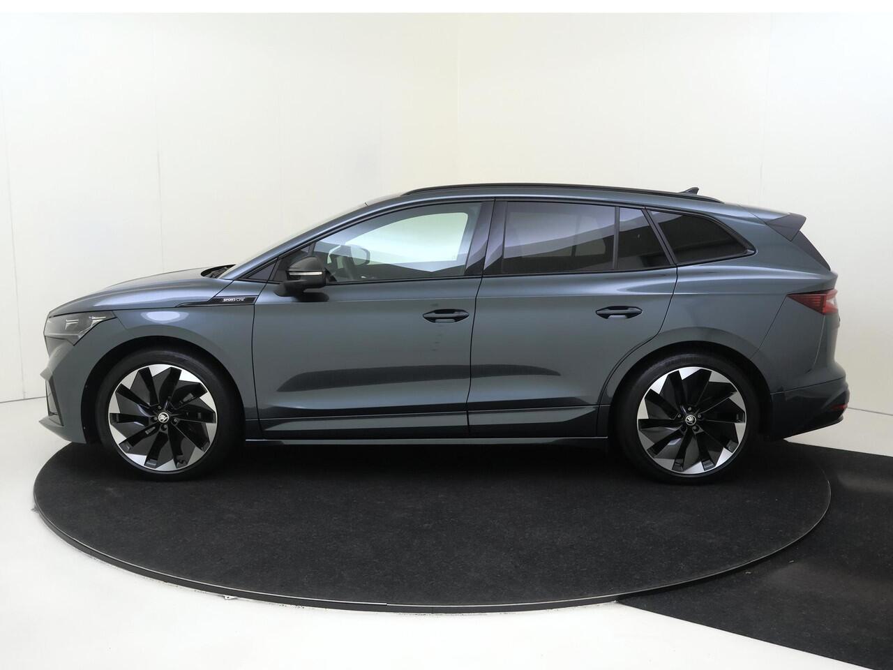 Skoda Enyaq iV 60 Sportline | Dodehoek detectie | Keyless | Achteruitrijcamera | LED matrix verlichting | Stuurwiel verwarmd | Adaptieve cruise control | 21 inch Licht metalen velgen | Navigatie |