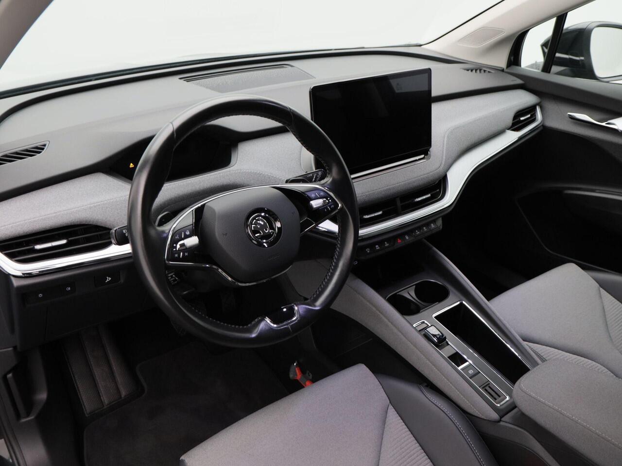 Skoda Enyaq iV 80 204 Pk Automaat | Adaptive Cruise | Stoelverwarming | Stuurverwarming | Navigatie | Trekhaak | 20 Inch | 70.388 Km!!