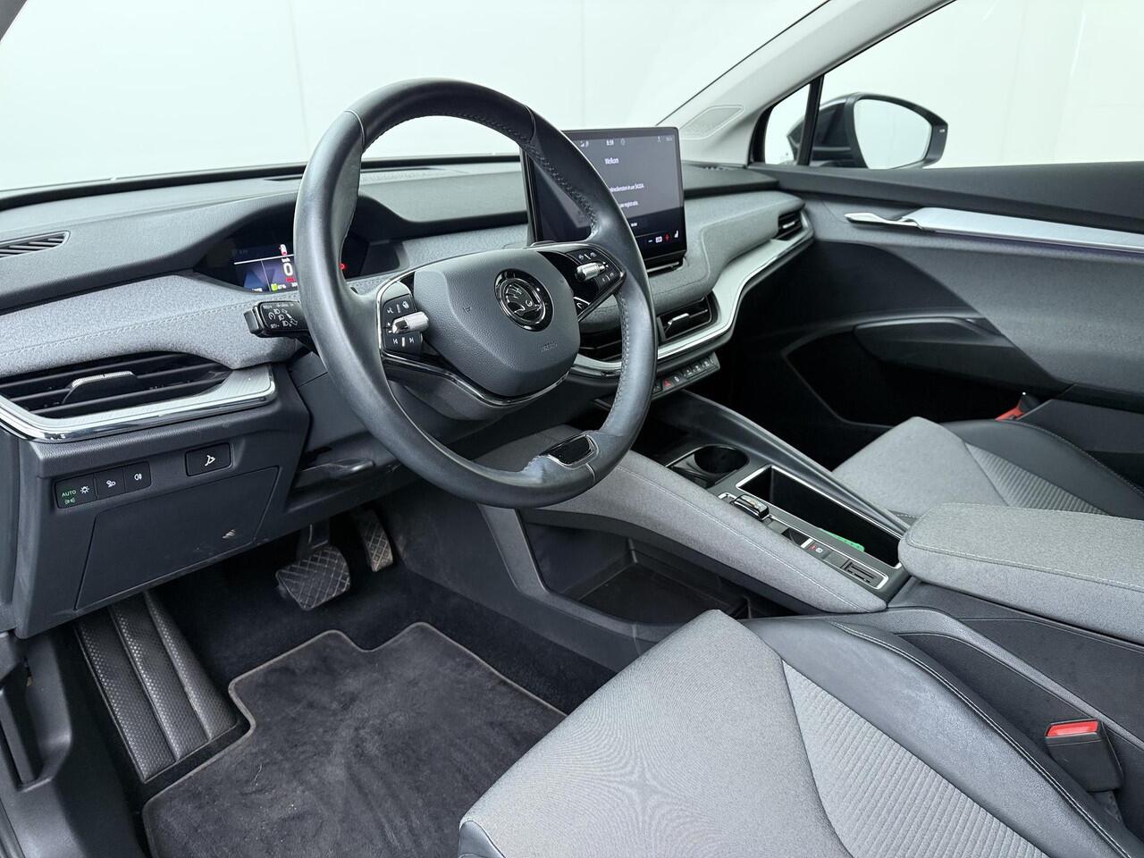 Skoda Enyaq iV 60 | 180 PK | SoH 91% | Achteruitrijcamera | Matrix LED koplampen | Voorstoelen verwarmd | 20" LM velgen |