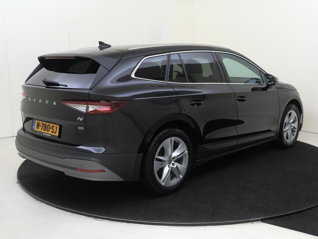 Skoda Enyaq iV 80 | SoH 91% | Warmtepomp | Dodehoek detectie | Keyless | Navigatie | Adaptieve cruise control | Achteruitrijcamera | Stoel- en stuurwielverwarming | 3-zone airco |