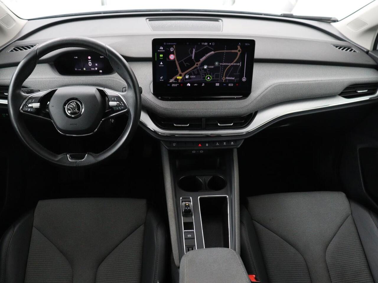 Skoda Enyaq iV 60 | SOH 92% | Trekhaak | Half leder | Sfeerverlichting | Carplay | Navigatie | 19'' | Cruise control | Parkeerhulp | Full LED