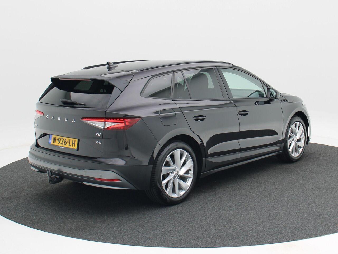 Skoda Enyaq iV 60 | SOH 92% | Stoelverwarming | Trekhaak | CarPlay | Adaptive Cruise | Camera | 20 Inch | 108.874 Km!