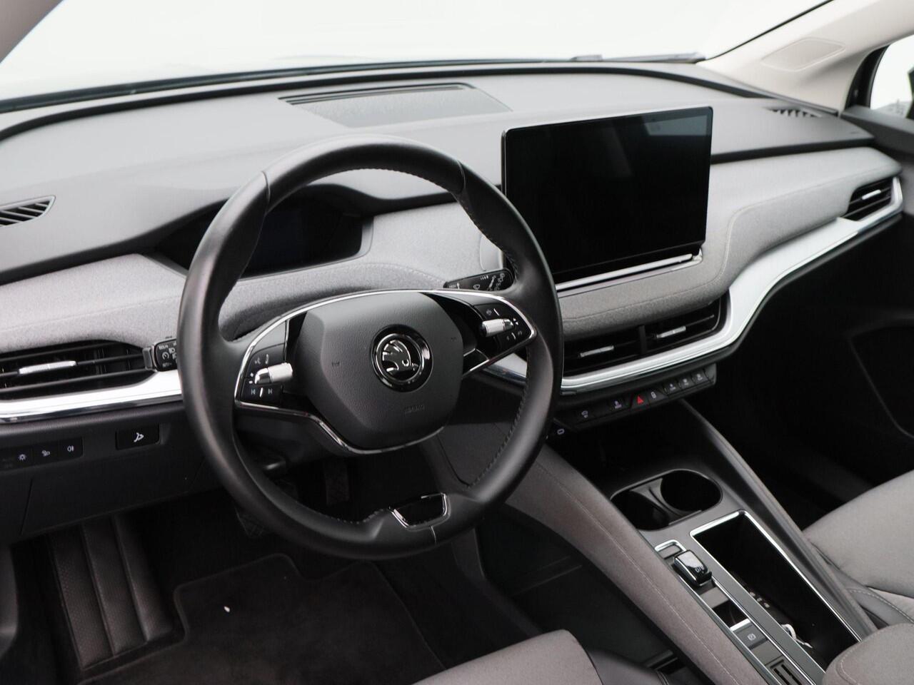 Skoda Enyaq iV 60 | SOH 92% | Stoelverwarming | Trekhaak | CarPlay | Adaptive Cruise | Camera | 20 Inch | 108.874 Km!