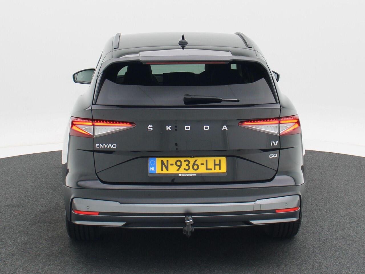 Skoda Enyaq iV 60 | SOH 92% | Stoelverwarming | Trekhaak | CarPlay | Adaptive Cruise | Camera | 20 Inch | 108.874 Km!