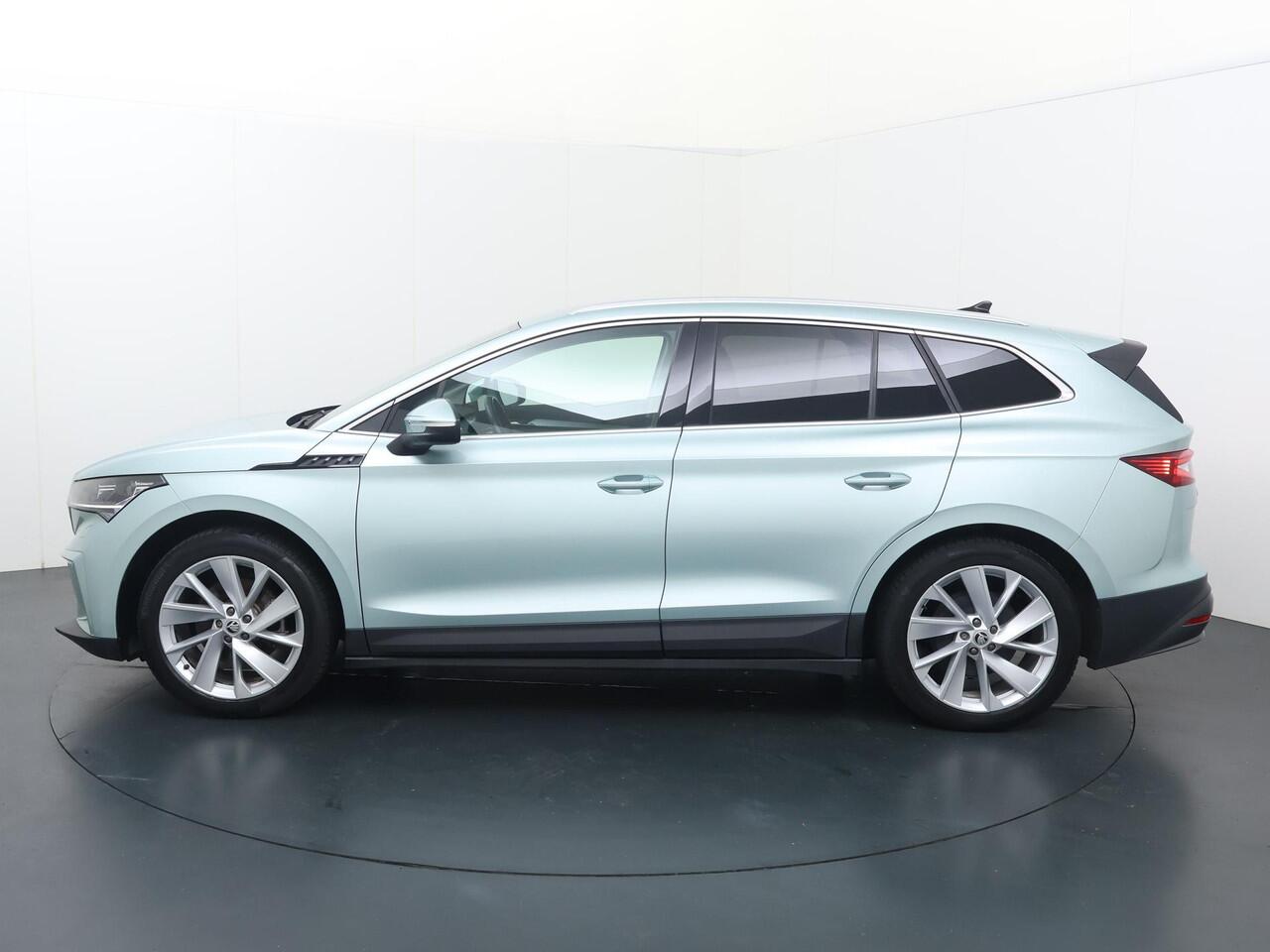 Skoda Enyaq iV 60 | 180 PK | SoH 89% | Trekhaak | Matrix LED koplampen | Voorstoelen verwarmd | 20" LM velgen | Achteruitrijcamera |