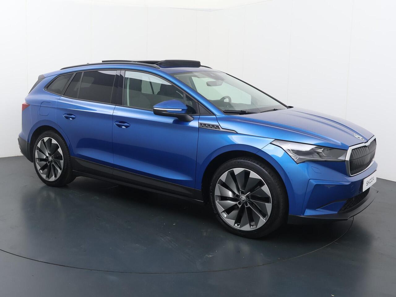 Skoda Enyaq iV 60 | 180 PK | SoH 90% | Panoramadak | Matrix LED koplampen | Lederen bekleding | Adaptive cruise control | Voorstoelen verwarmd |