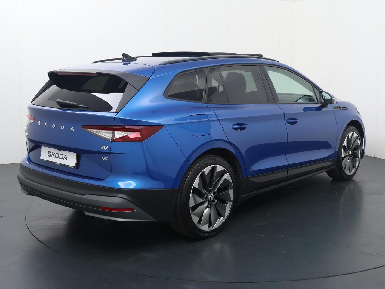 Skoda Enyaq iV 60 | 180 PK | SoH 90% | Panoramadak | Matrix LED koplampen | Lederen bekleding | Adaptive cruise control | Voorstoelen verwarmd |