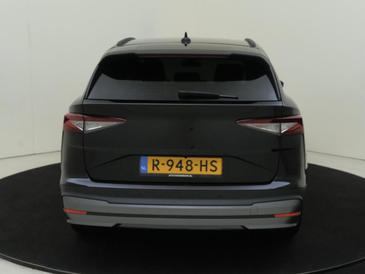 Skoda Enyaq iV 60 | Achteruitrijcamera | Parkeerassistent | Navigatie | Cruise control | Voorklimatisering | Sfeerverlichting | Elektrisch inklapbare buitenspiegels |