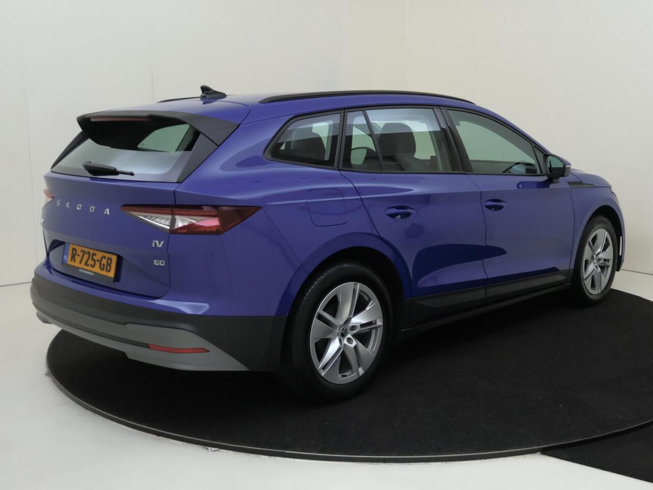 Skoda Enyaq iV 60 | Parkeerassistent | Navigatie | Cruise control | Voorklimatisering | CarPlay | Parkeersensoren | Lane- en frontassist |