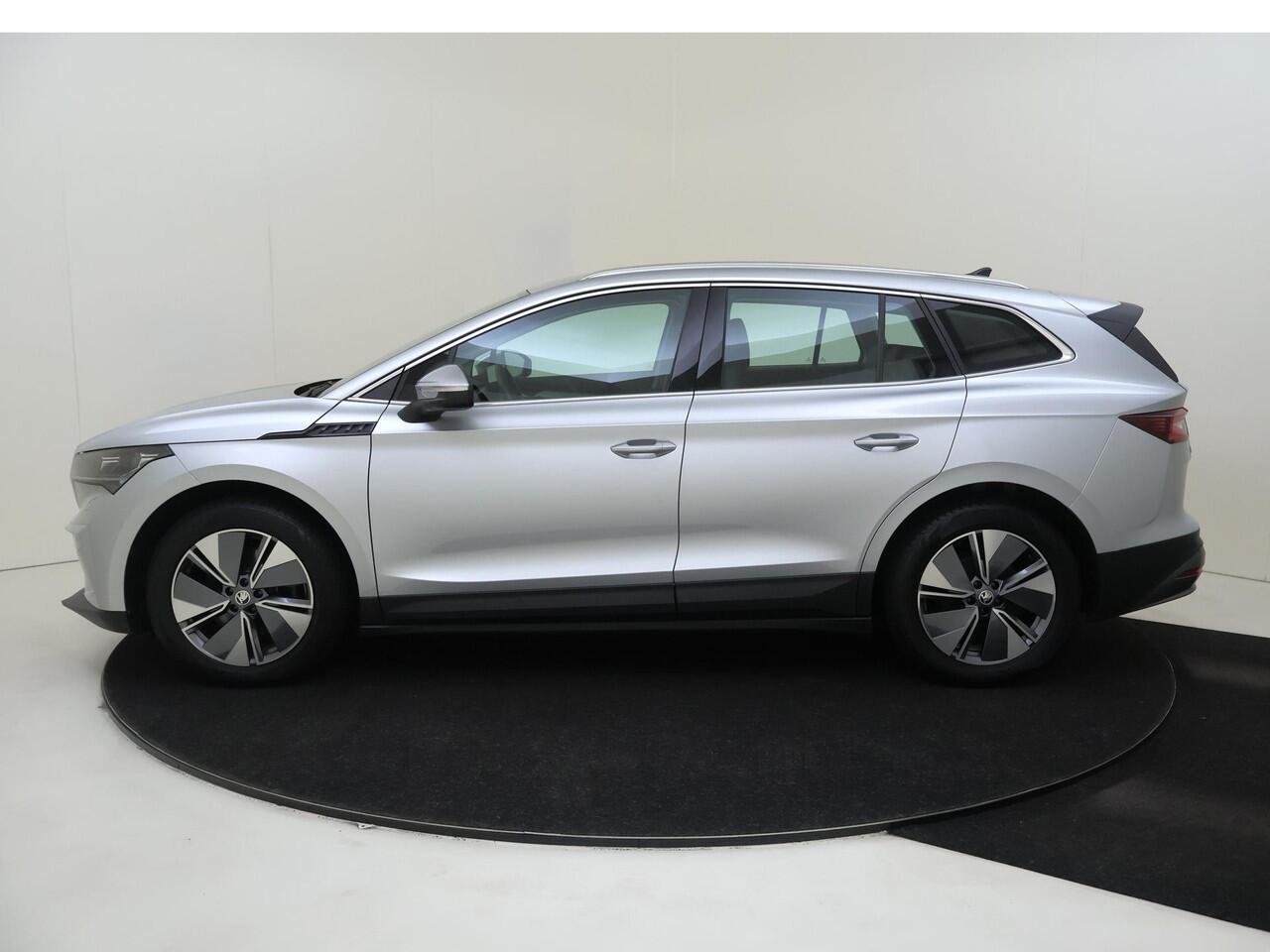 Skoda Enyaq iV 80 | Achteruitrijcamera | Dodehoek detectie | Stoel- en stuurwielverwarming | 3-zone airco | LED matrix verlichting | Adaptieve cruise control | Navigatie |