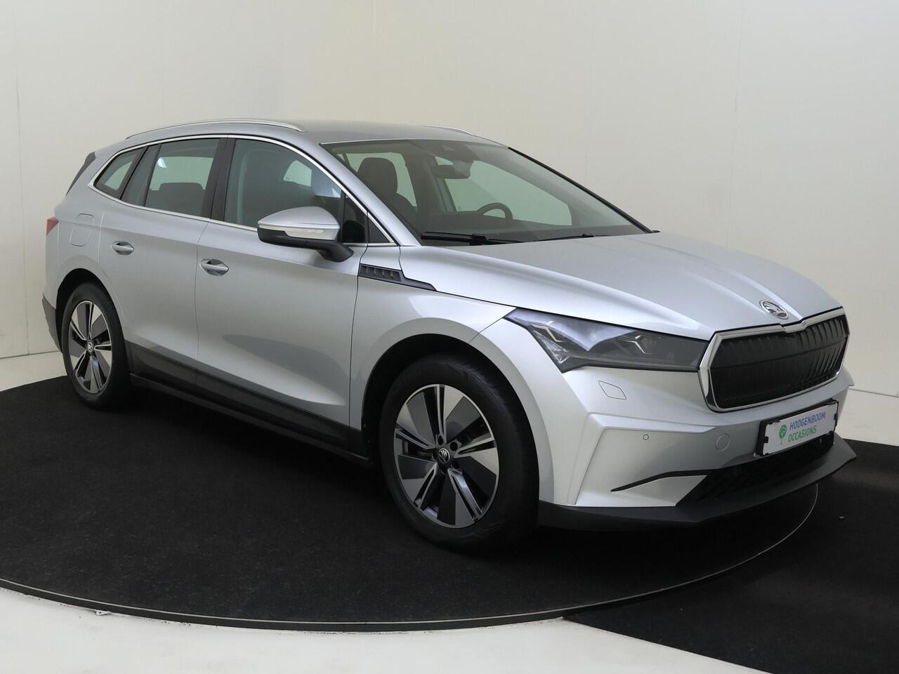 Skoda Enyaq iV 80 | Achteruitrijcamera | Dodehoek detectie | Stoel- en stuurwielverwarming | 3-zone airco | LED matrix verlichting | Adaptieve cruise control | Navigatie |