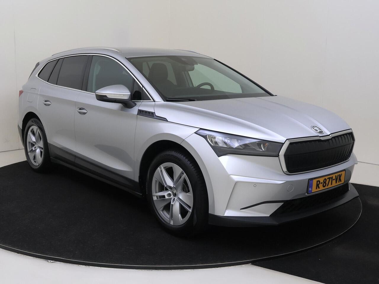 Skoda Enyaq iV 80 Business Edition | Dodehoek detectie | Stoel- en stuurwielverwarming | Achteruitrijcamera | 3-zone airco | Adaptieve cruise control | Navigatie | Keyless |