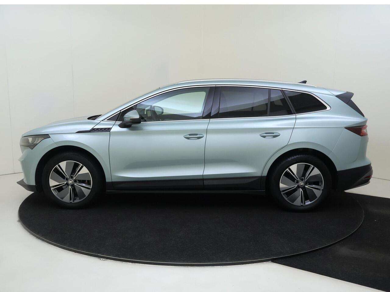 Skoda Enyaq iV 80 | Keyless | 3-zone airco | Achteruitrijcamera | Voorklimatisering | Stoel- en stuurwielverwarming | CarPlay | Cruise control | Navigatie |