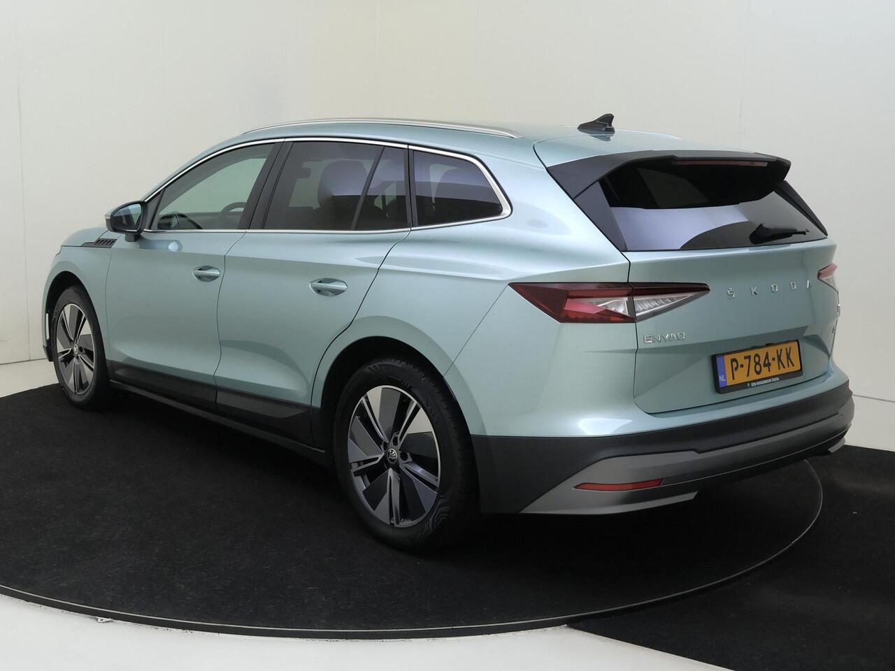 Skoda Enyaq iV 80 | Keyless | 3-zone airco | Achteruitrijcamera | Voorklimatisering | Stoel- en stuurwielverwarming | CarPlay | Cruise control | Navigatie |