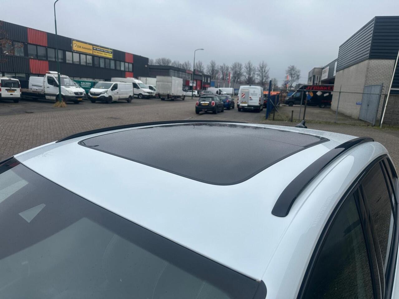 Skoda Enyaq iV 60 Sportline | SOH 90% | 21 INCH | PANORAMA | SFEERVERLICHTING | SPORTSTOELEN | CARPLAY |