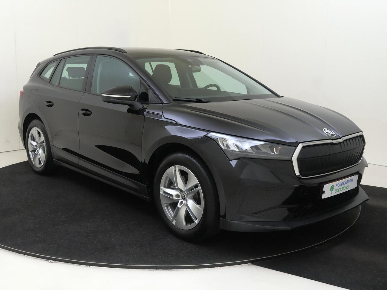 Skoda Enyaq iV 60 Selection | Navigatie | Achteruitrijcamera | Cruise control | CarPlay | Voorklimatisering | Sfeerverlichting | Elektrisch inklapbare buitenspiegels |