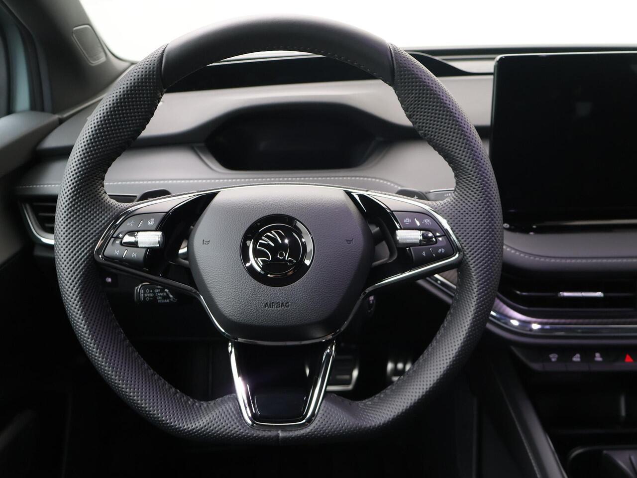 Skoda Enyaq iV 60 Sportline 180 pk | Navigatie | Apple Carplay/Android Auto | Crystal Face | Panoramadak | 21" lichtmetalen velgen |