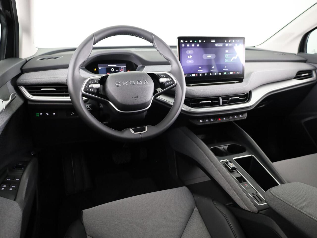 Skoda Enyaq iV 85 Business Edition 286pk | Elektrische stoel | Blind Spot | Adaptive Cruise Control | Navigatie | Camera | Bumpers in carroserie kleur