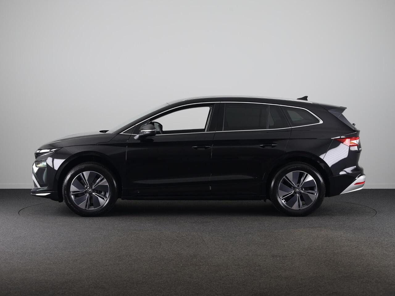 Skoda Enyaq iV 85 Business Edition 286pk | Elektrische stoel | Blind Spot | Adaptive Cruise Control | Navigatie | Camera | Bumpers in carroserie kleur