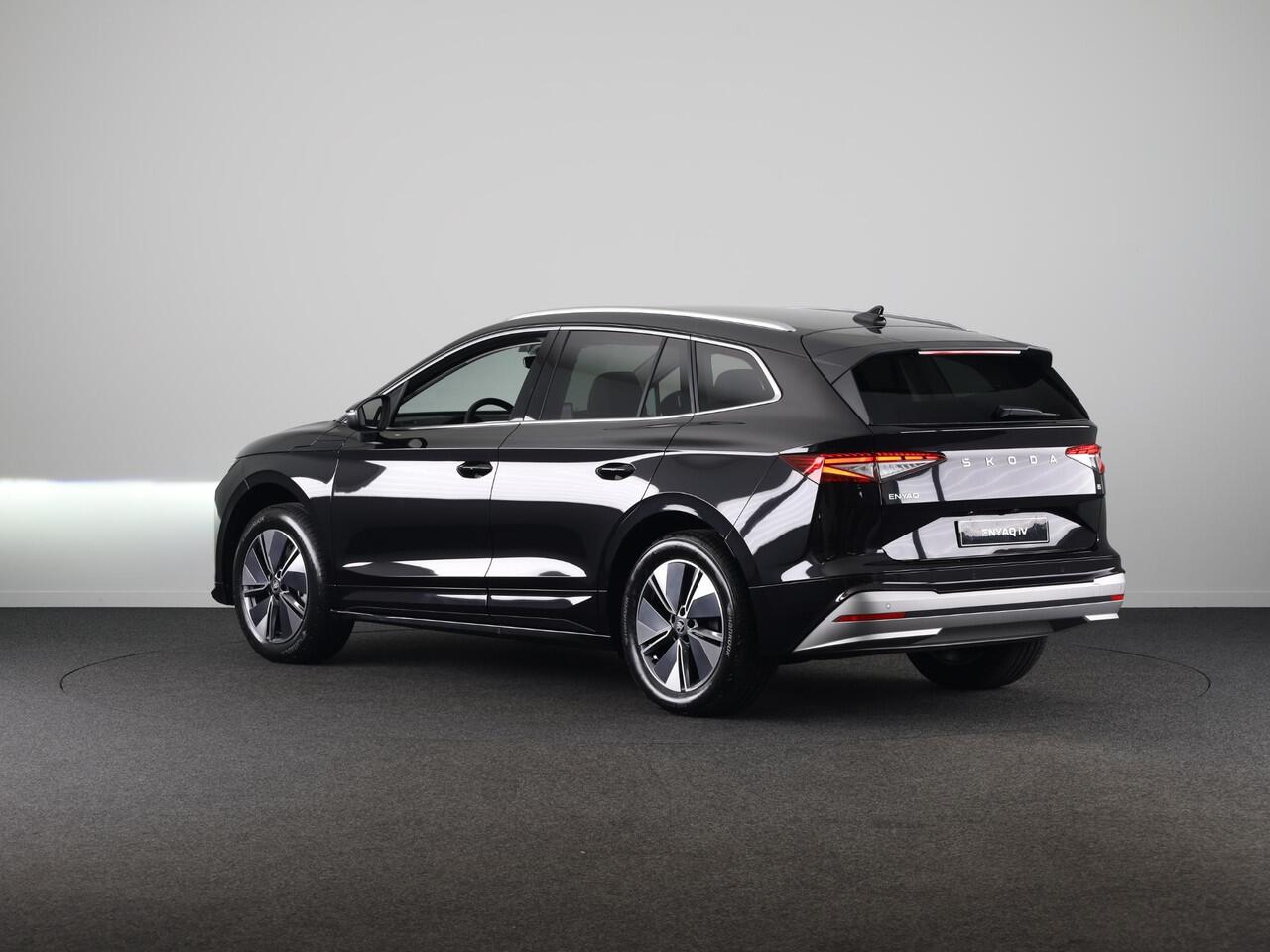 Skoda Enyaq iV 85 Business Edition 286pk | Elektrische stoel | Blind Spot | Adaptive Cruise Control | Navigatie | Camera | Bumpers in carroserie kleur