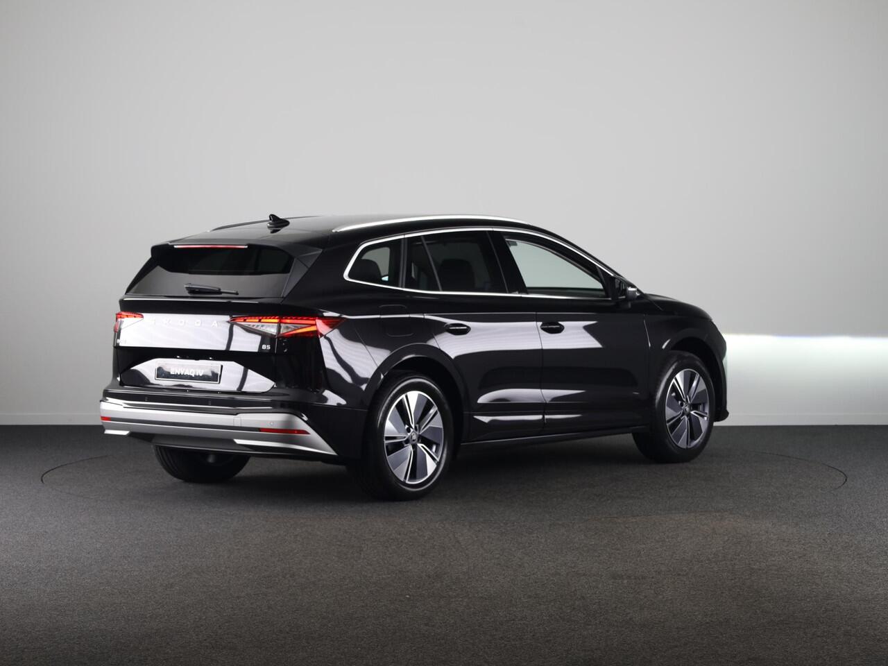 Skoda Enyaq iV 85 Business Edition 286pk | Elektrische stoel | Blind Spot | Adaptive Cruise Control | Navigatie | Camera | Bumpers in carroserie kleur