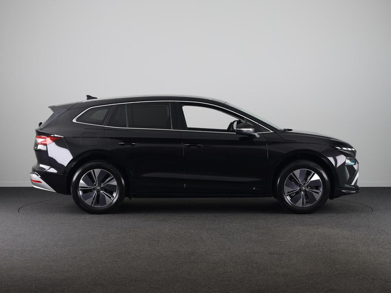 Skoda Enyaq iV 85 Business Edition 286pk | Elektrische stoel | Blind Spot | Adaptive Cruise Control | Navigatie | Camera | Bumpers in carroserie kleur