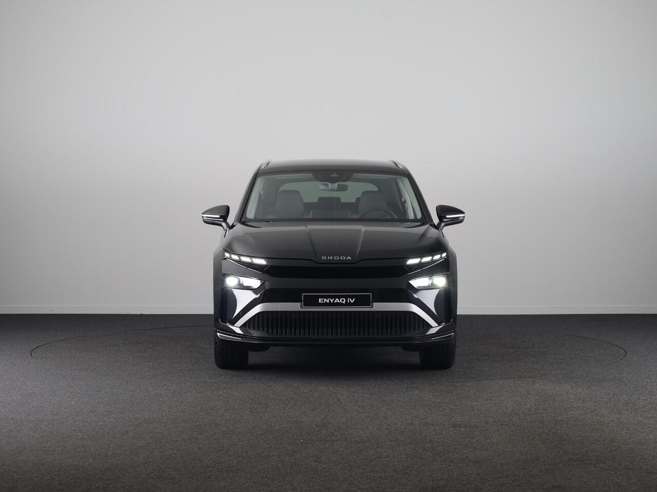 Skoda Enyaq iV 85 Business Edition 286pk | Elektrische stoel | Blind Spot | Adaptive Cruise Control | Navigatie | Camera | Bumpers in carroserie kleur