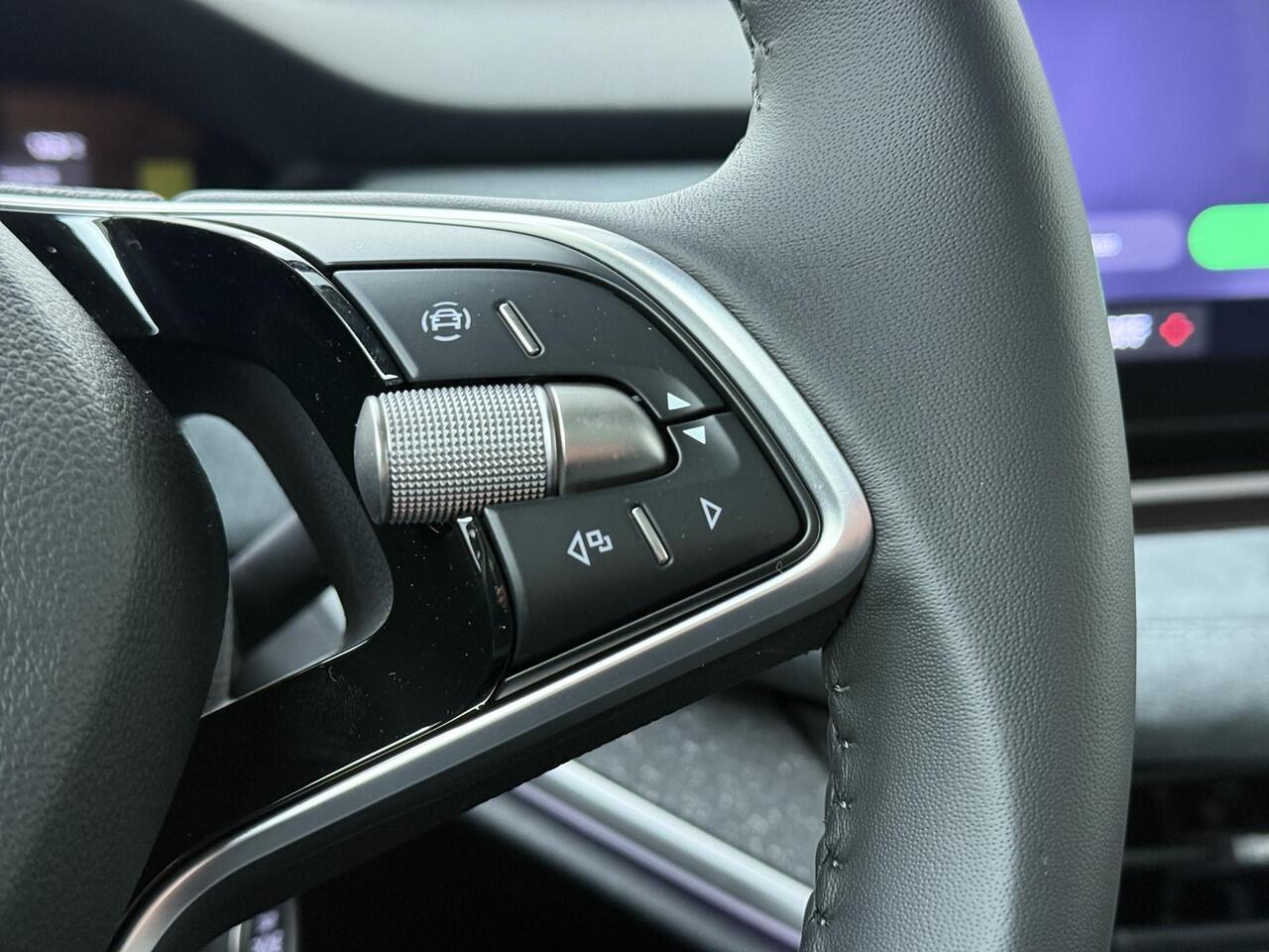 Skoda Enyaq iV Coupé 85 Business Edition 286 PK | Trekhaak | 21" lichtmetalen velgen | Lounge Interieur pakket |