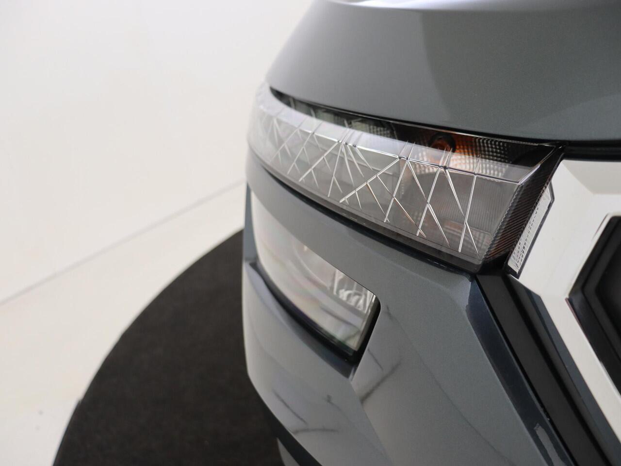 Skoda Kamiq 1.0 TSI Ambition | Cruise control | CarPlay | Lane assist | Bluetooth | Airco | Armsteun voor |