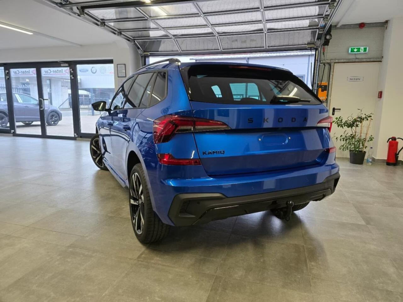Skoda Kamiq 1.5 TSI DSG MONTE CARLO GLAS-DAK/CAMERA/TREKHAAK/NAVI/CARPLAY/STOELVERW