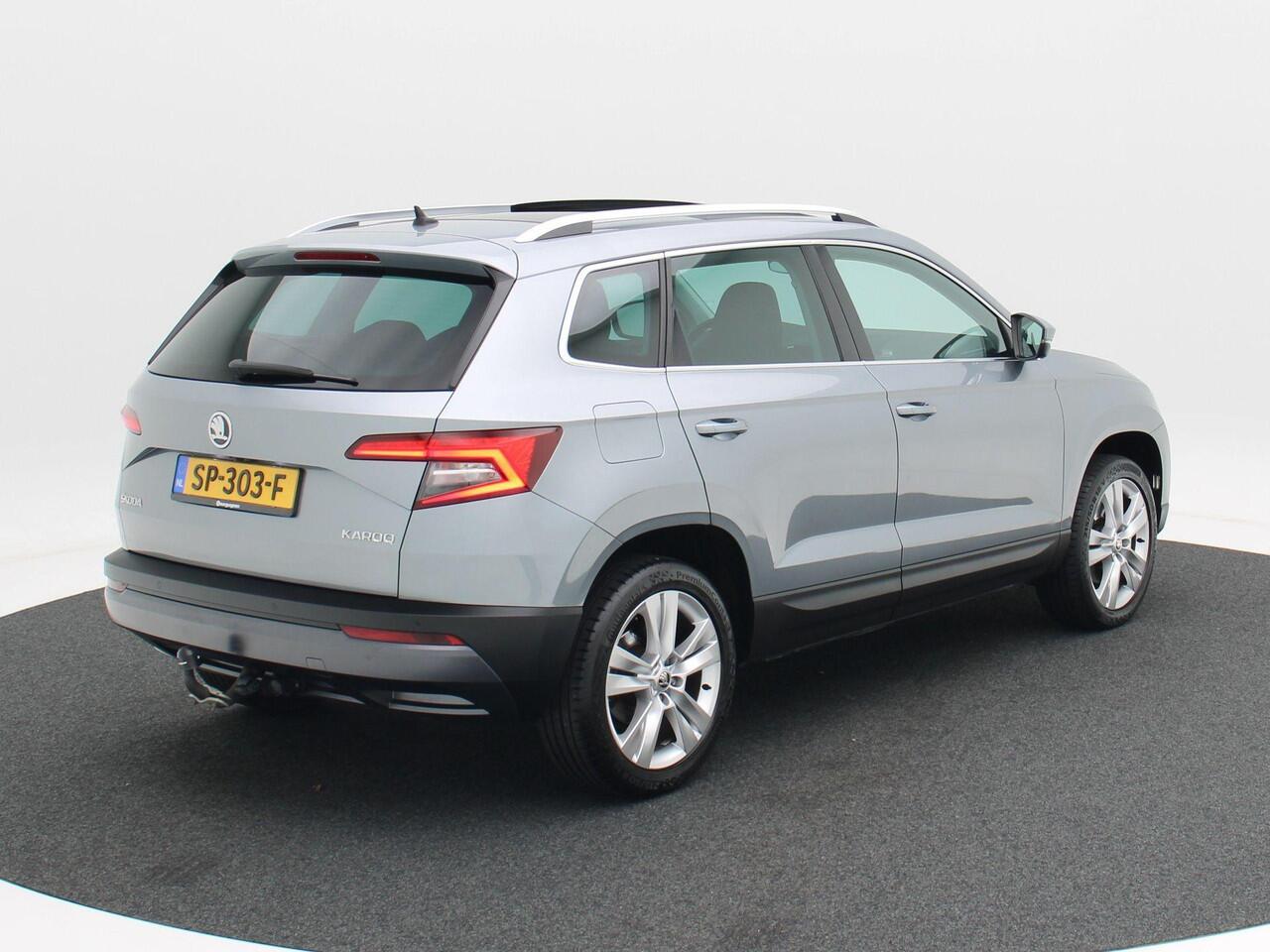 Skoda Karoq 1.5 TSi 150 Pk Style Business | Panoramadak | Canton | Trekhaak | Stoelverwarming | Adaptive Cruise | Navigatie | Carplay | Camera | 18 inch | 108.873 Km!!