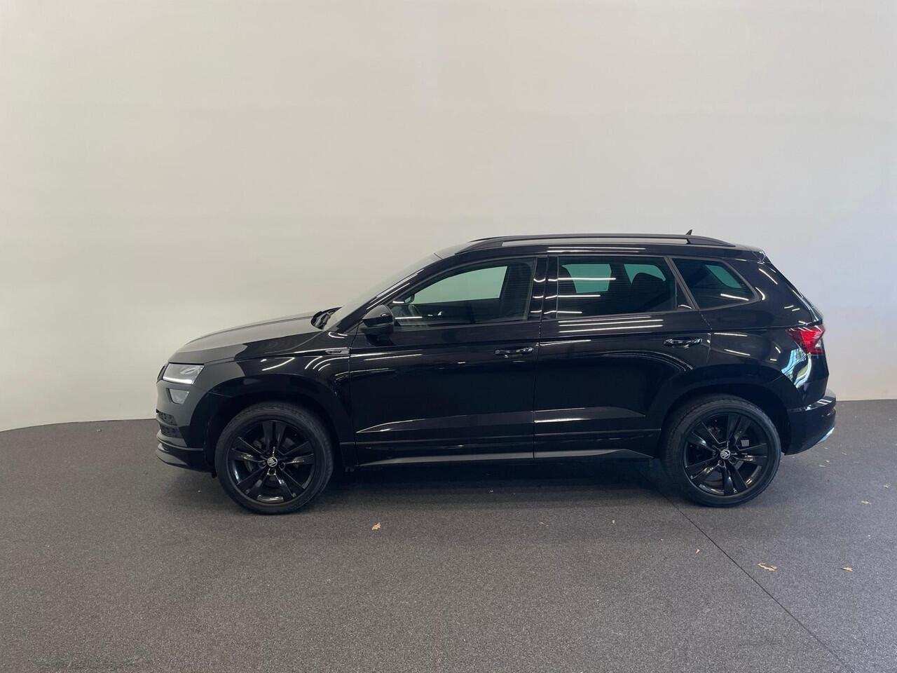 Skoda Karoq 1.5 TSI DSG Sportline Navigatie Apple Carplay/Android Auto Camera Parkeersensoren Cruise Control Elektrische achterklep Stoelverwarming Virtual Cockpit Climate Control Lichtmetalen velgen